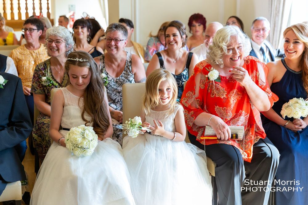 Mother of the bride laughs during the wedding ceremony. West tower wedding photographer. Lancashire wedding venue.