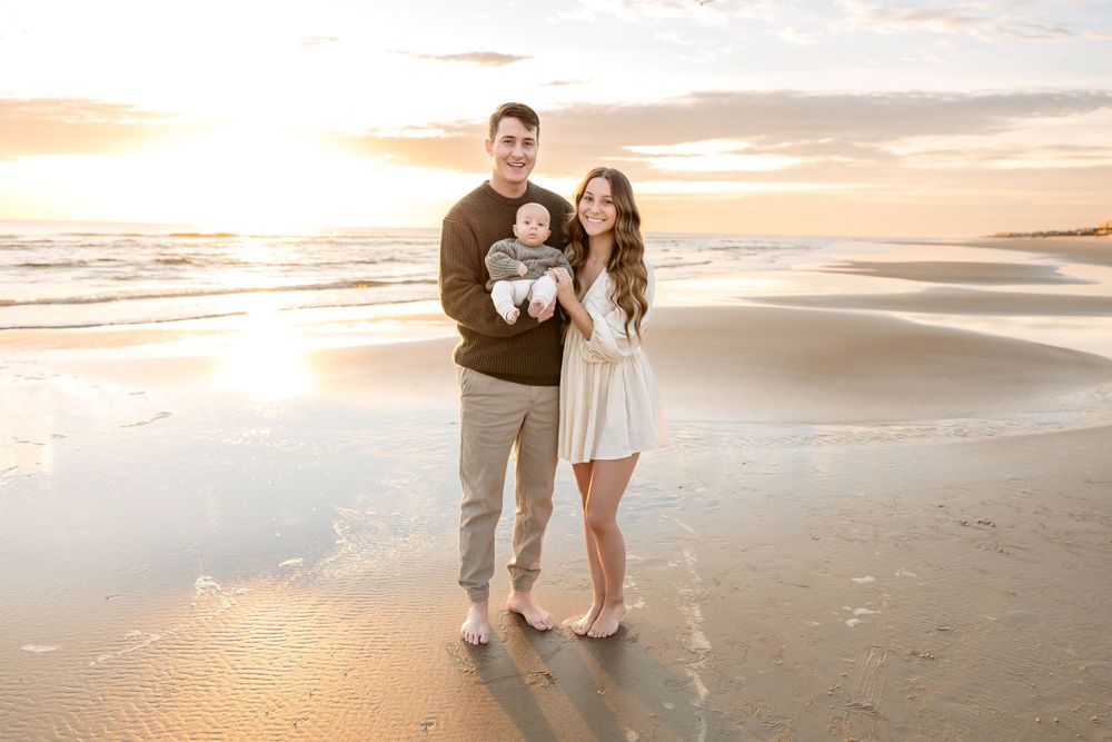 Family photography session on St. Augustine Beach during sunrise
