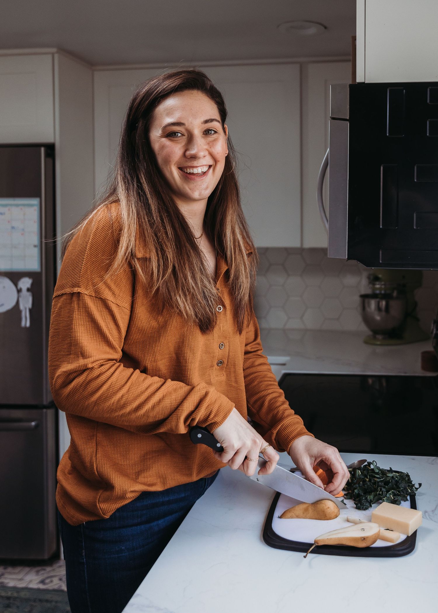 Cozy kitchen scene with cutting board and fresh ingredients.