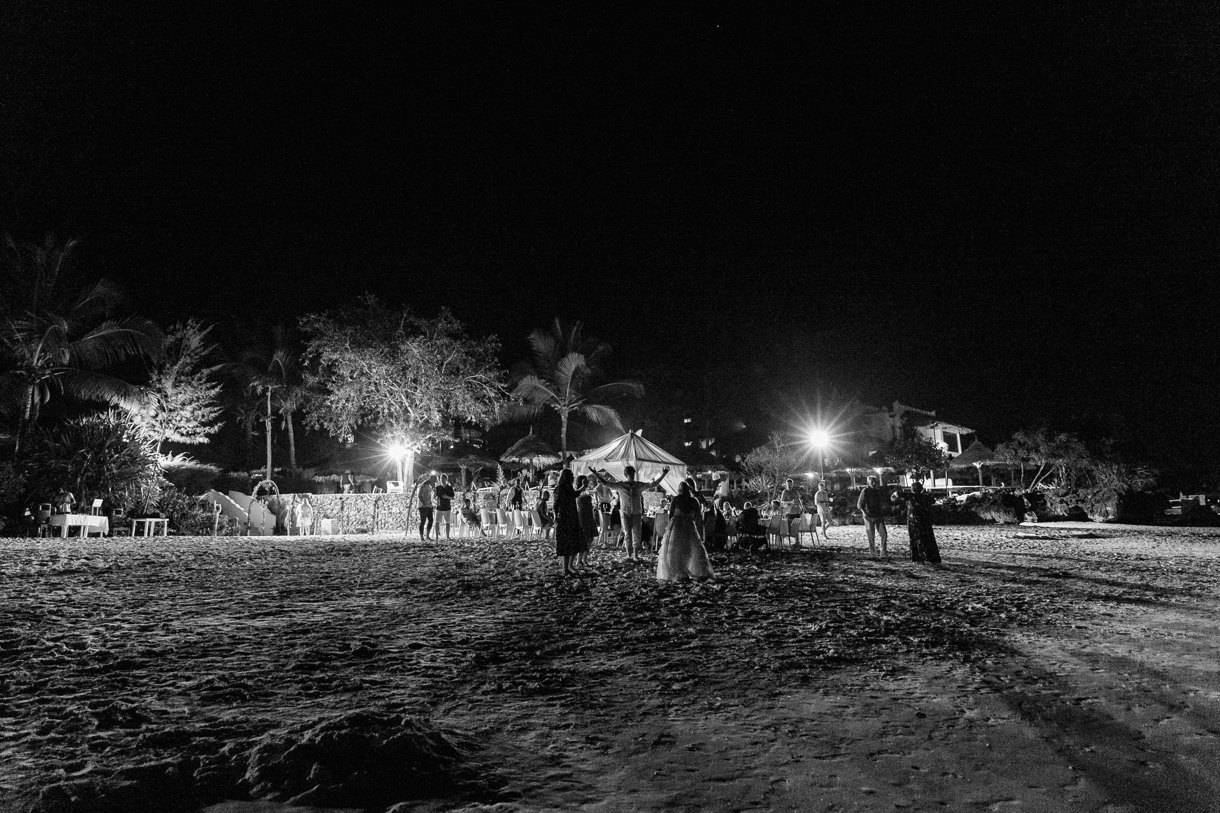 An epic beach wedding reception in Nungwi beach, Zanzibar. By photographers; Dust and Dreams Photography.