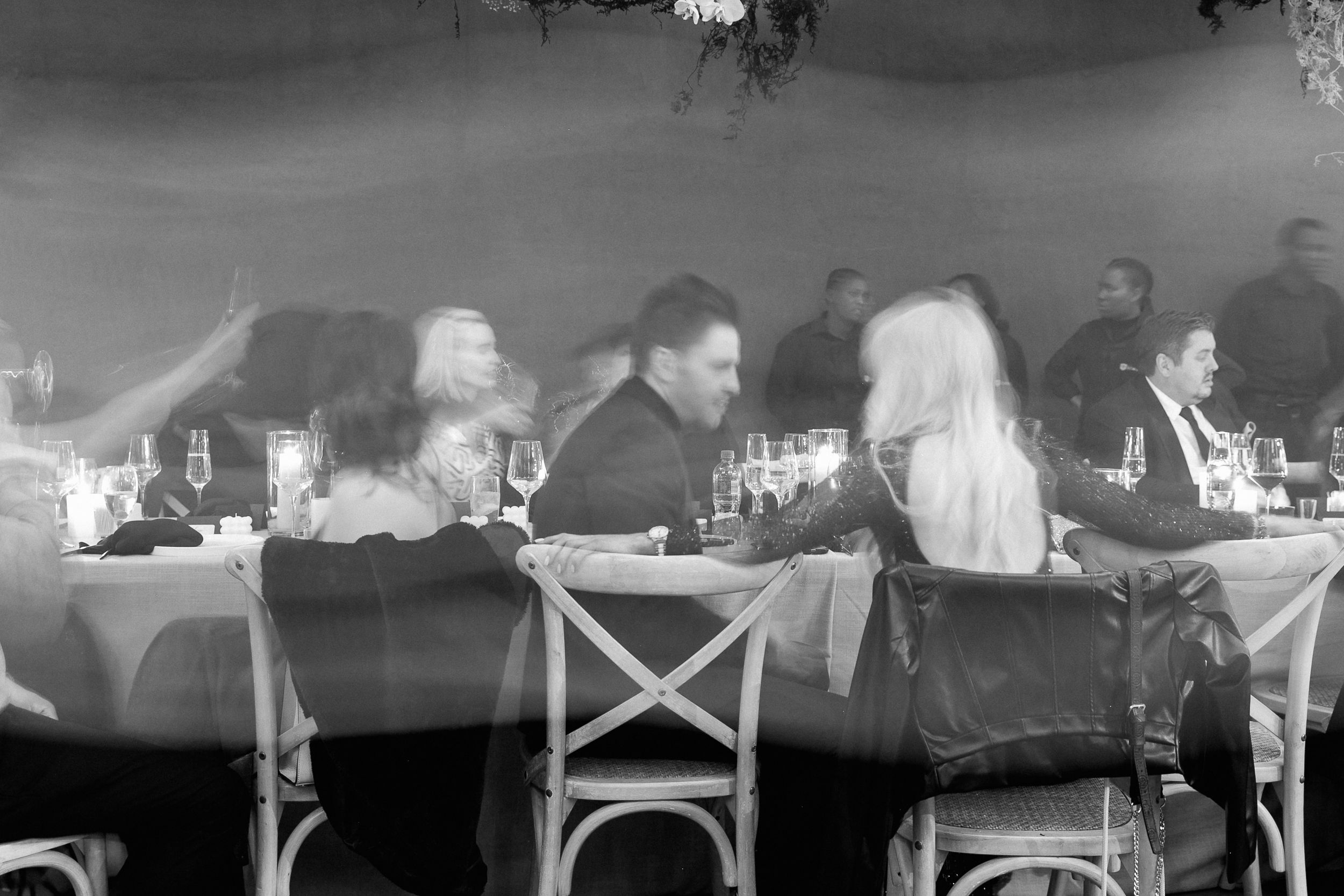 Slow shutter speed shwoing guests enjoying a modern wedding reception in South Africa.
