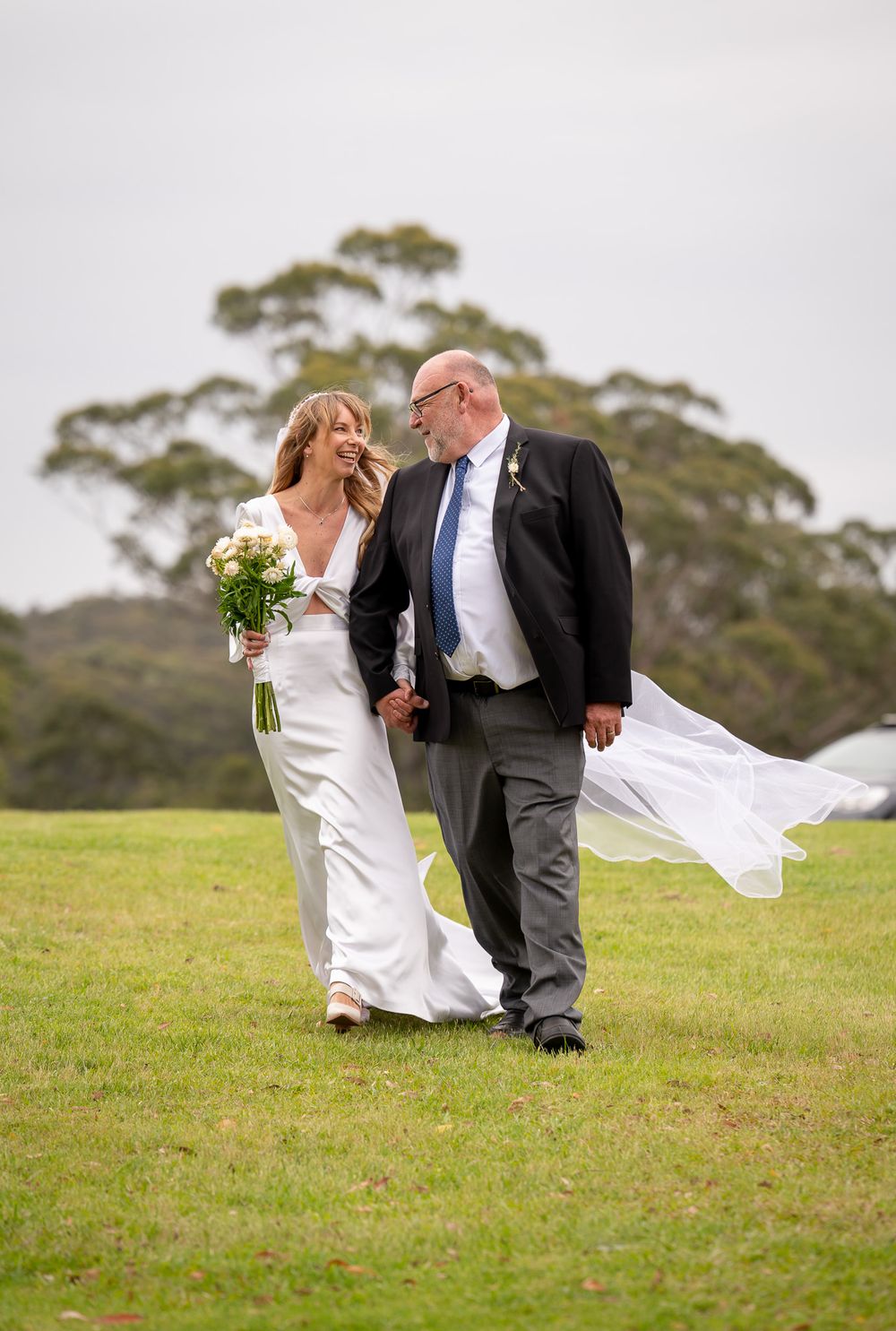 Bride and Father of the bride walking down the aisle