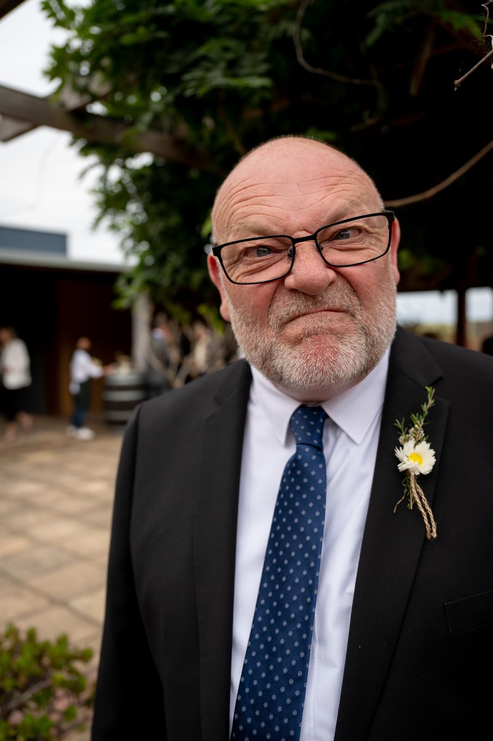 Guest pulling funny face at a wedding