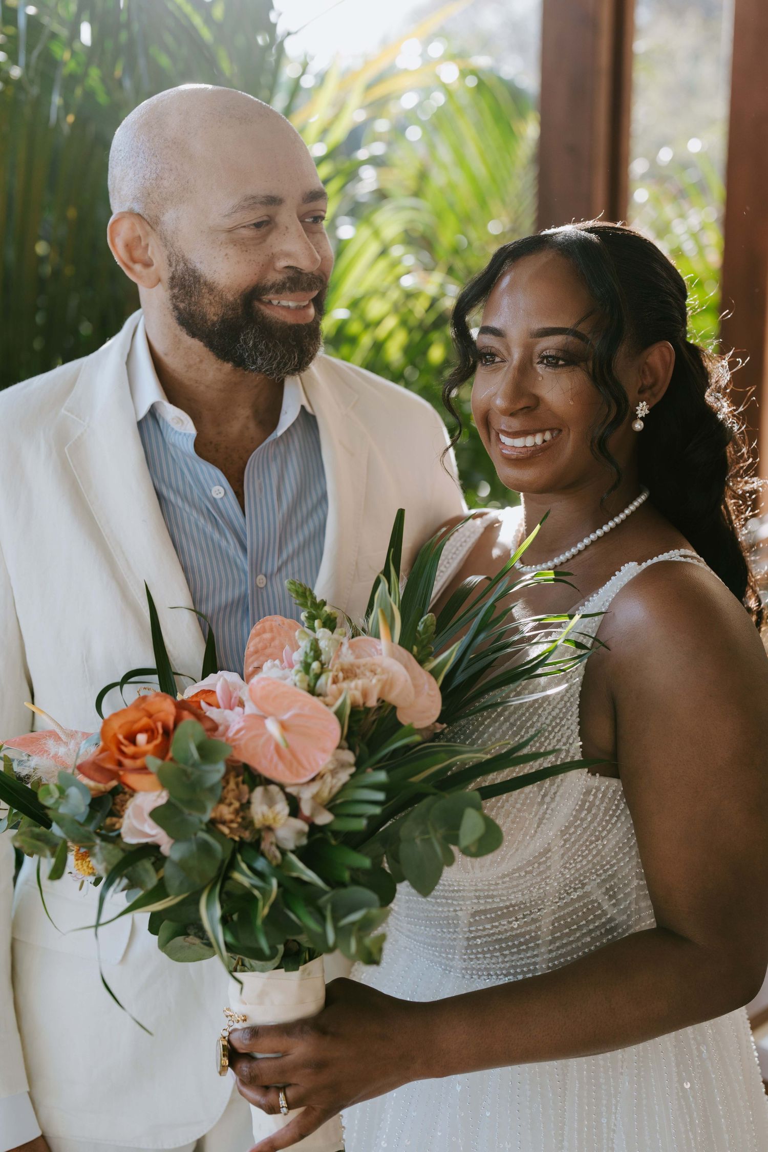 ender and emotional, the first look between the bride and her father unfolds, capturing a moment of love and pride