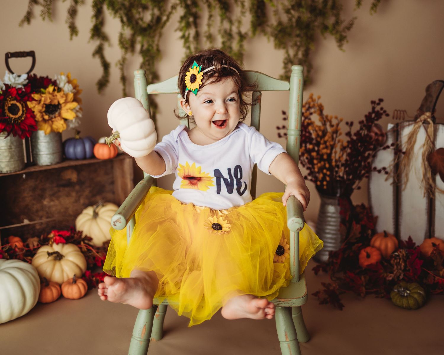 Maine sunflower themed toddler one-year milestone professional photoshoot