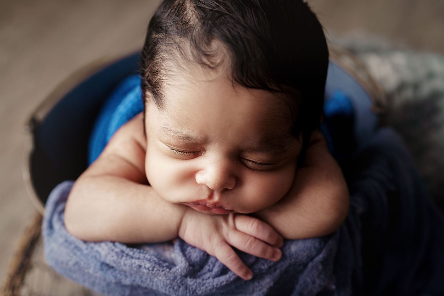 newborn photography baby in a bucket