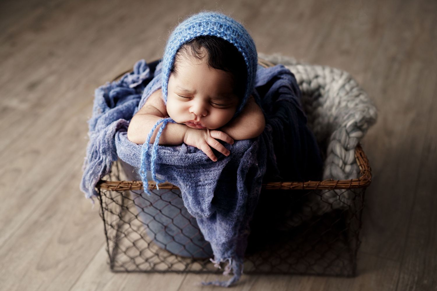 newborn photography baby in a bucket