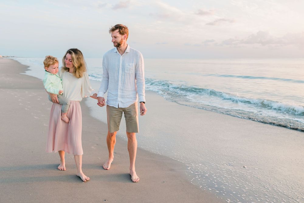 family walking on beach, Lifestyle Family Photographer, Melbourne, FL