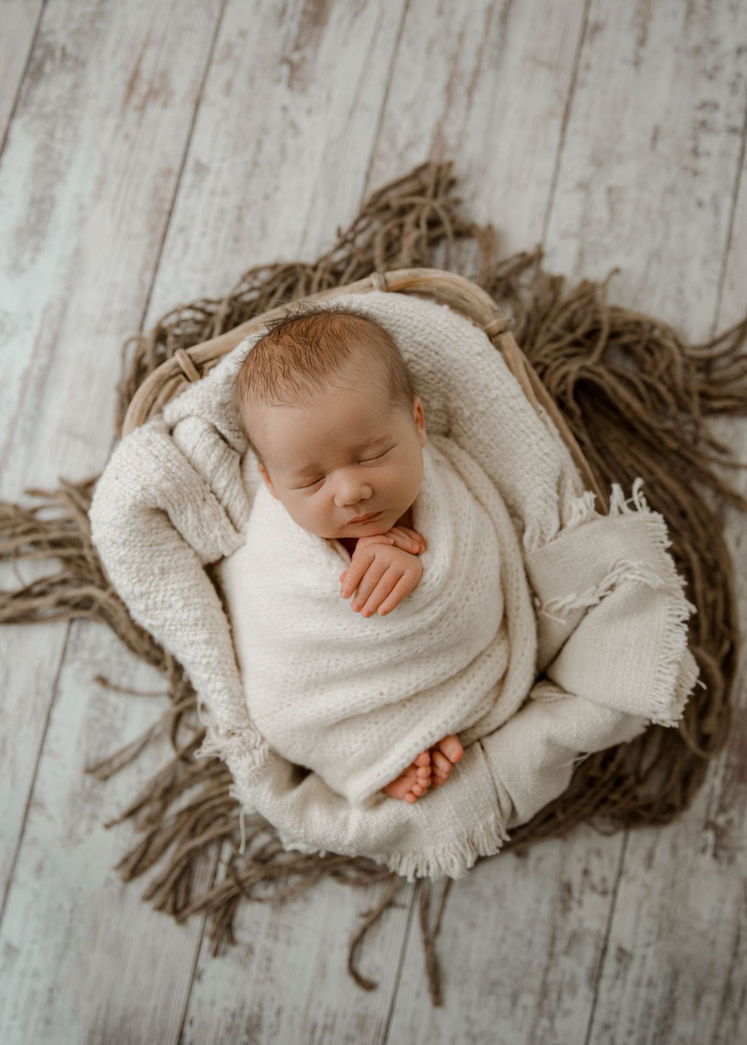 simple newborn in basket