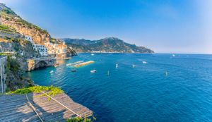Positano, Italy with boats and dark blue water
