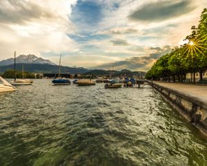 Lucerne, Switzerland with lake and mountain at sunset