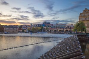 Autumn sunset in Prague with a view of Prague, Castle.