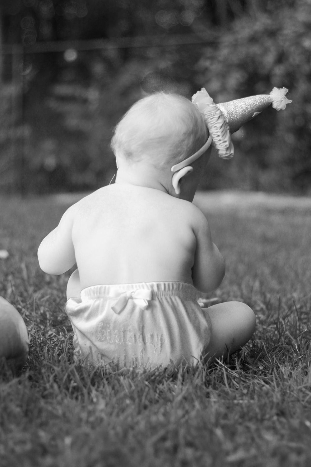 baby girl one year old with birthday hat