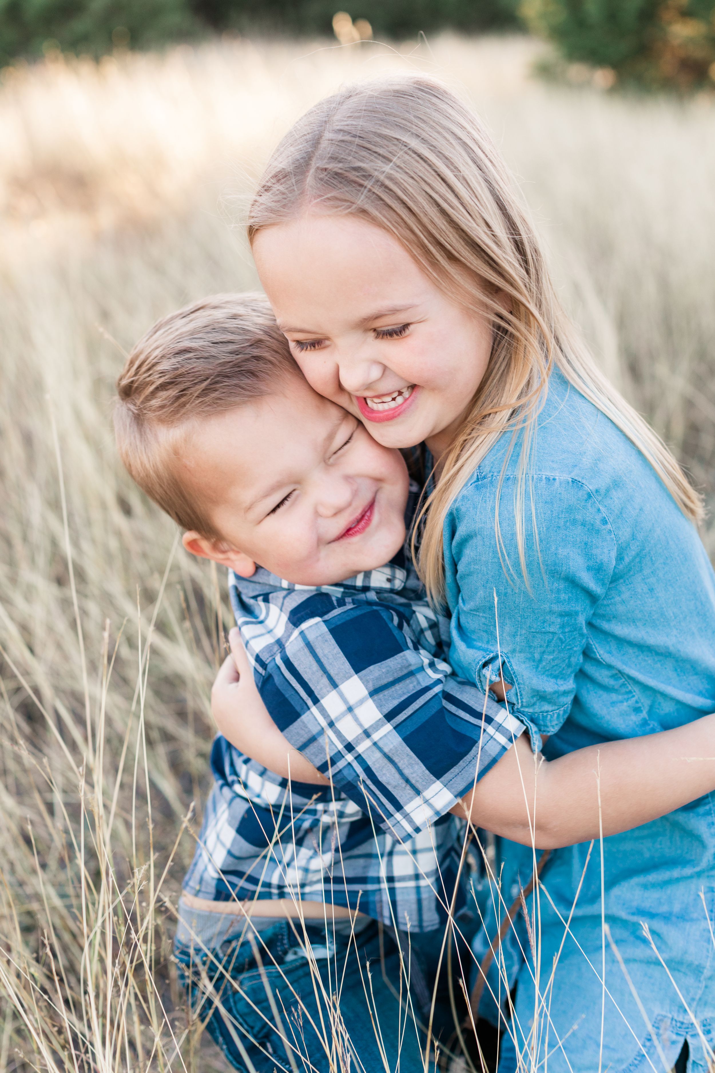 Family portrait of kids hugging in Austin, Texas
