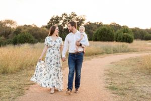 Husband and wife family photos with baby in Austin, Texas