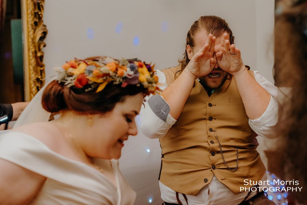 grooms dance moves at ruthin castle. north Wales wedding photographer.
