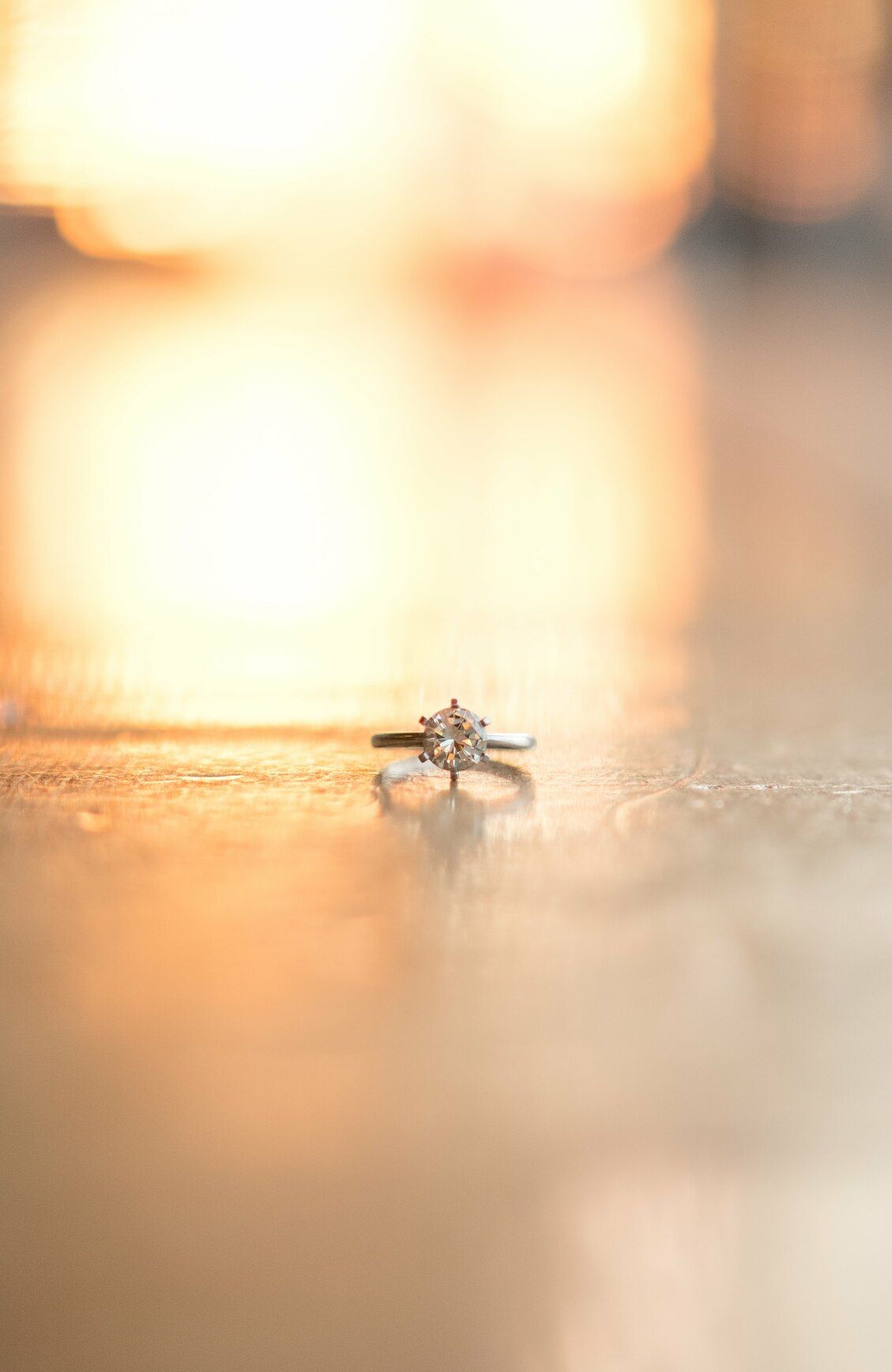 Engagement ring with sunset background