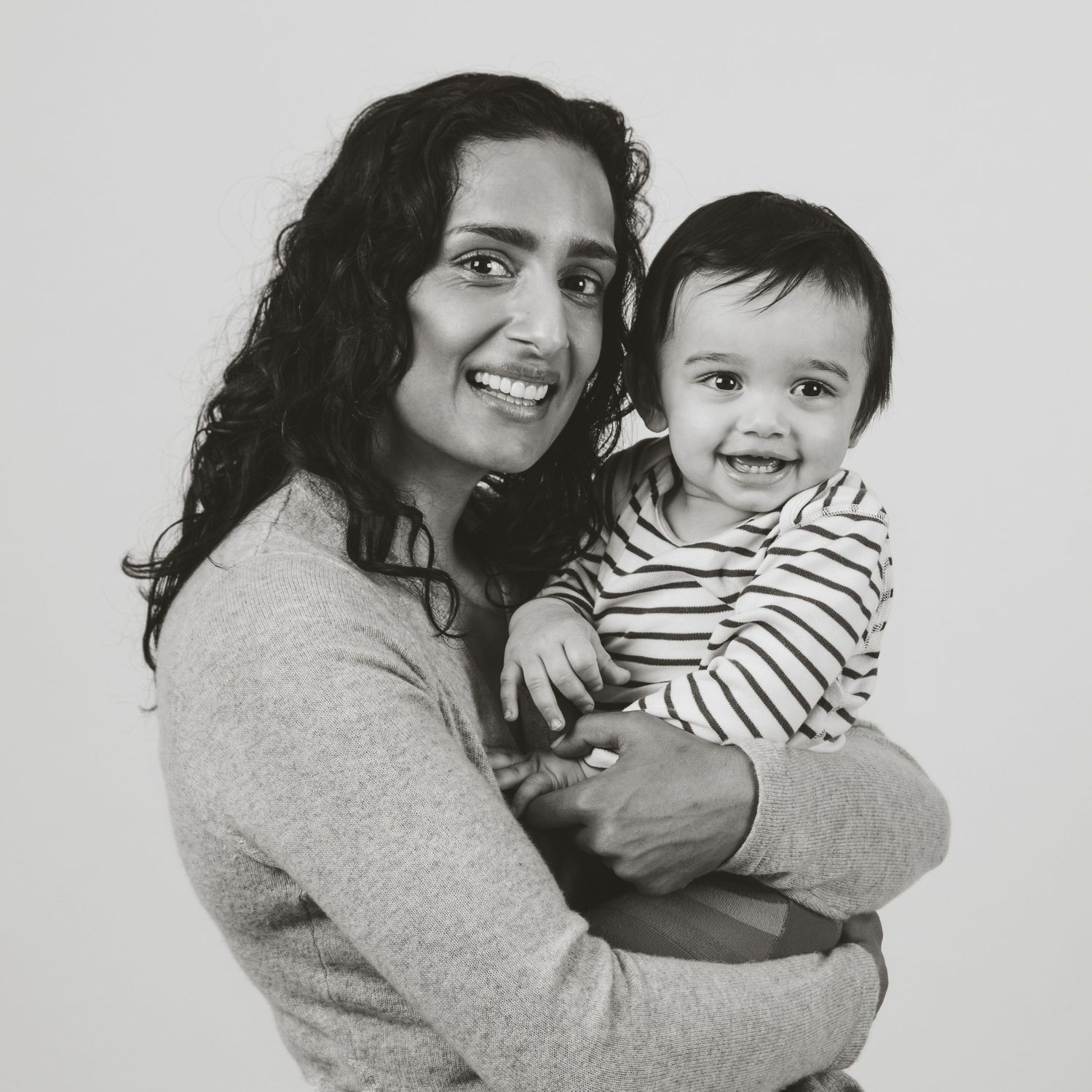 A joyful portrait of parent and child sharing a happy moment together.