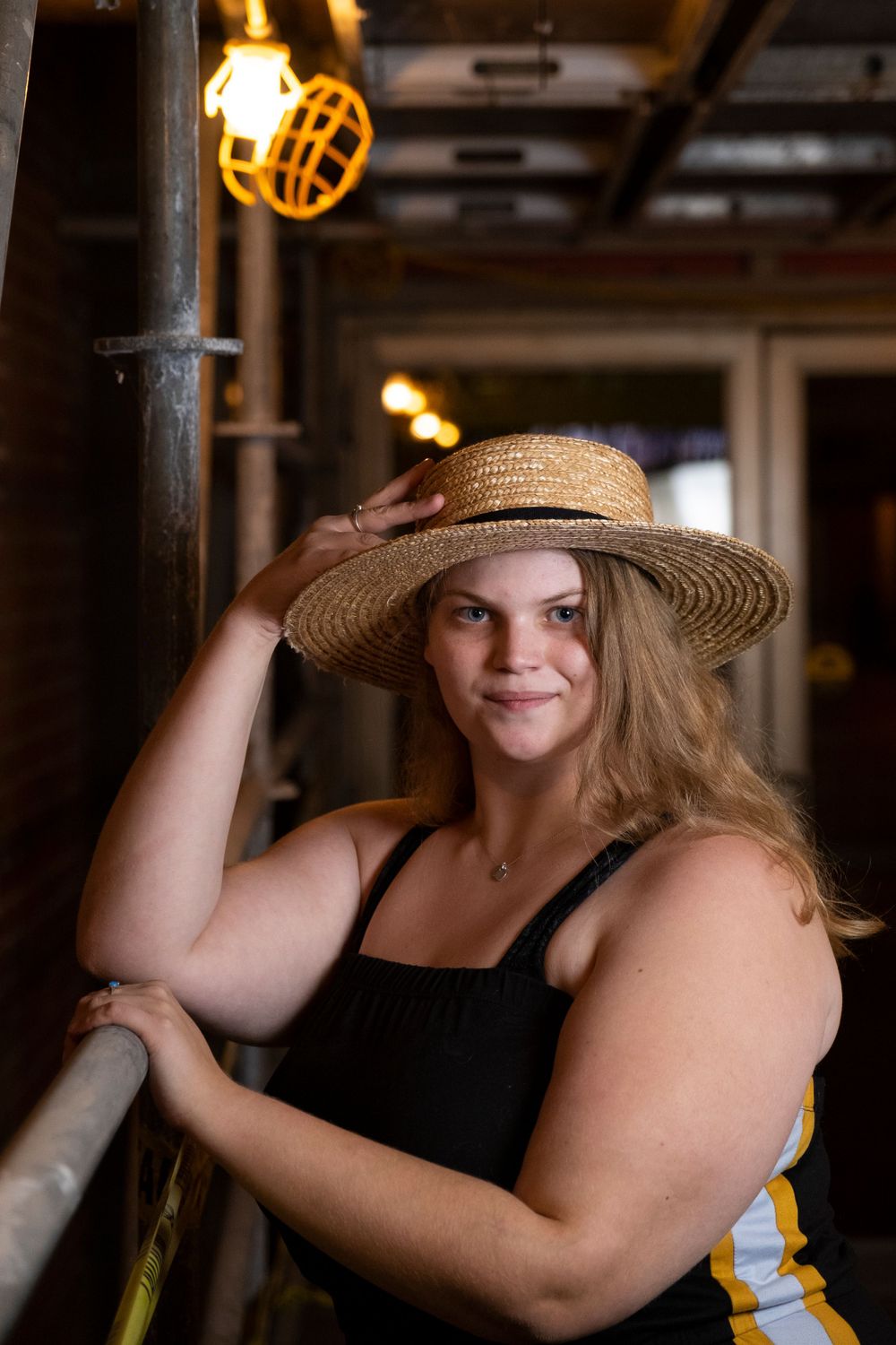 girl under scaffolding