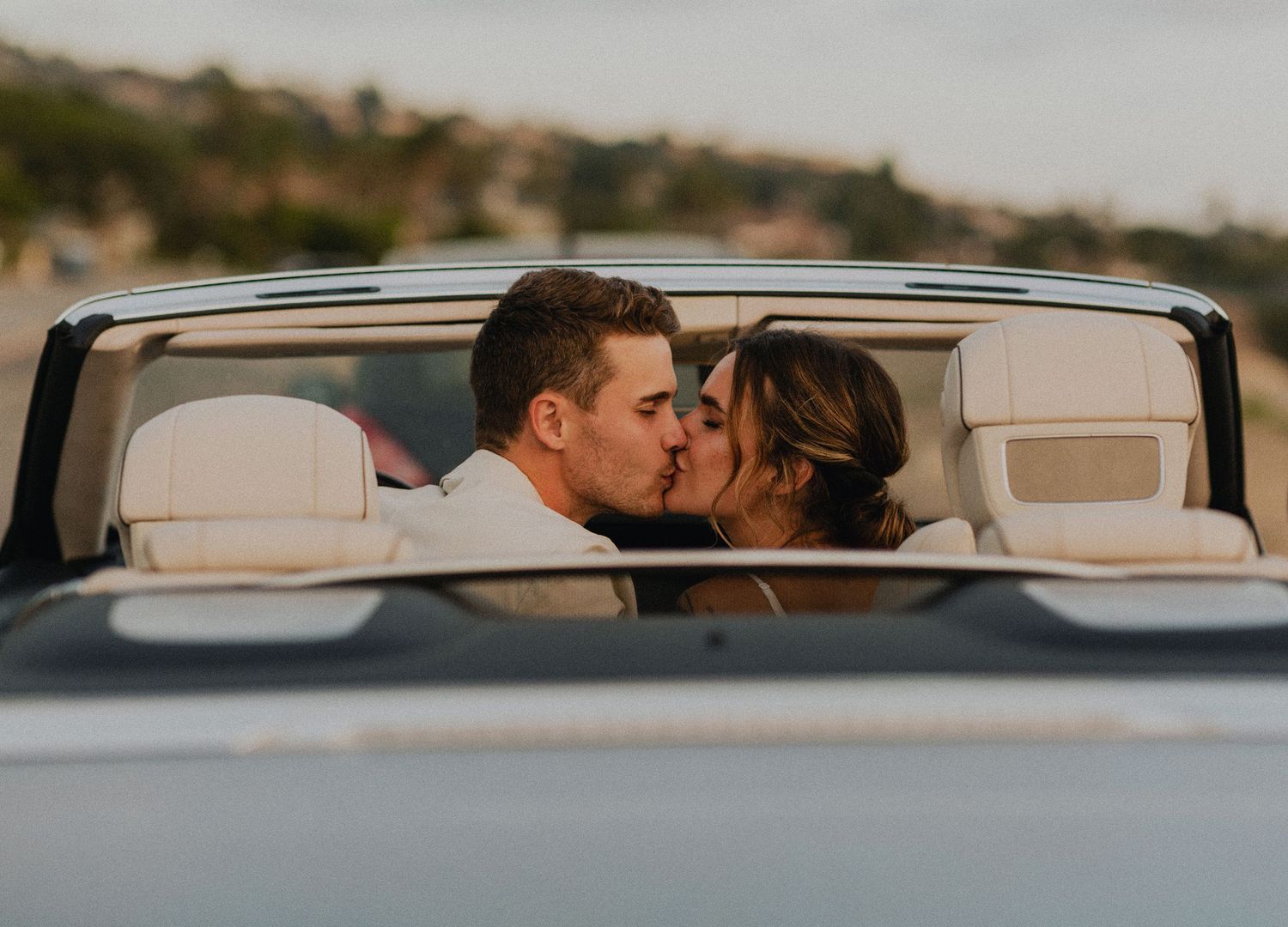 Bride and groom couple's portraits after a Palos Verdes cliffs wedding overlooking the ocean