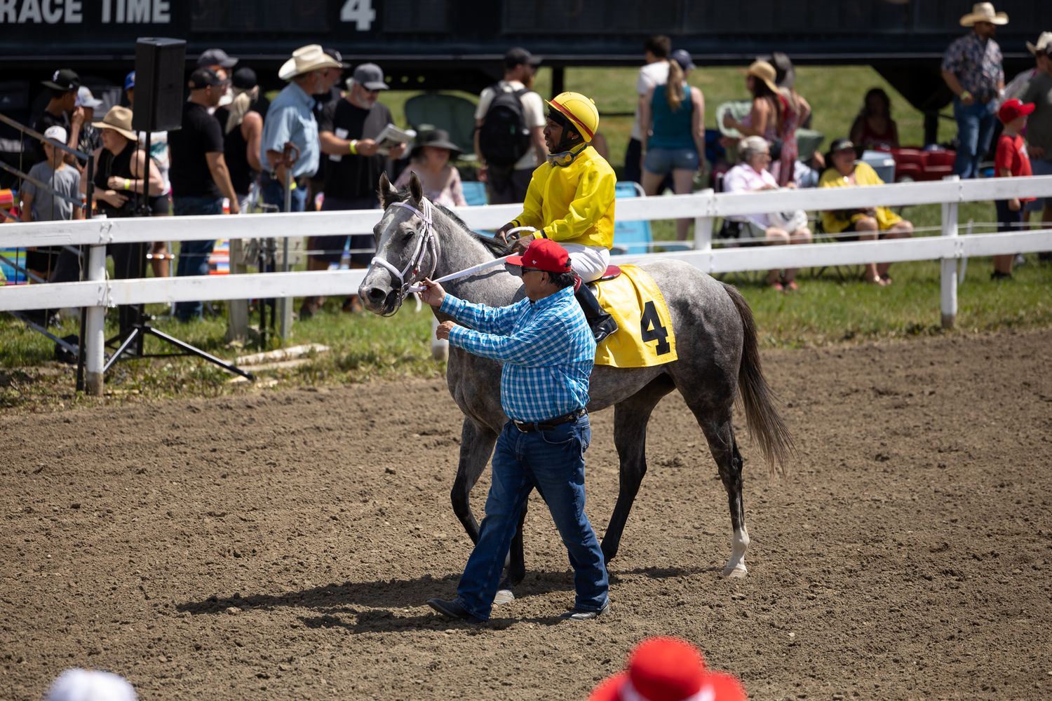 A Winning Jockey heading the Winners Circle, Millarville Ab