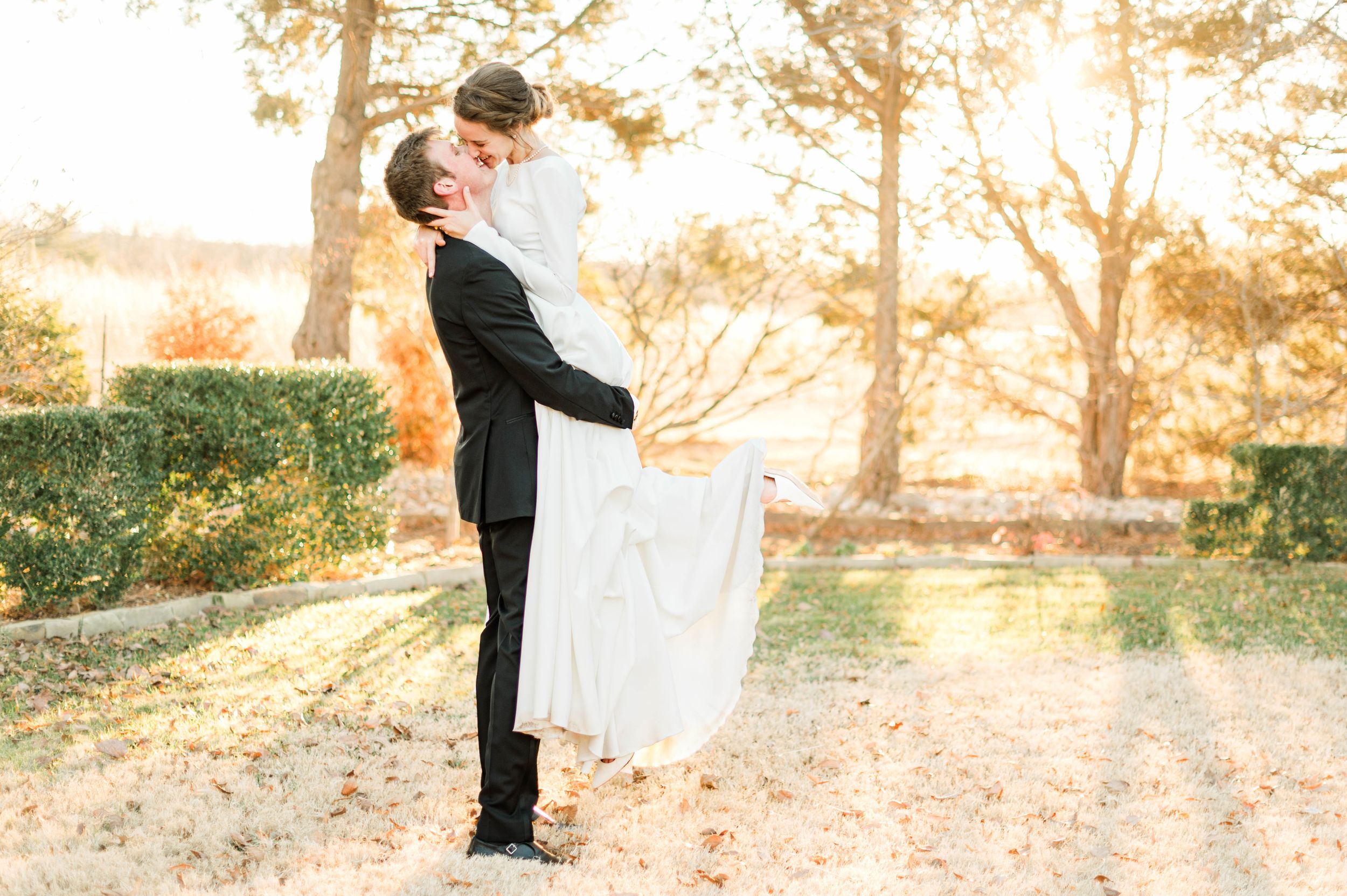 Sunset portraits of husband and wife at Meditations Event Center in Stillwater, Oklahoma.