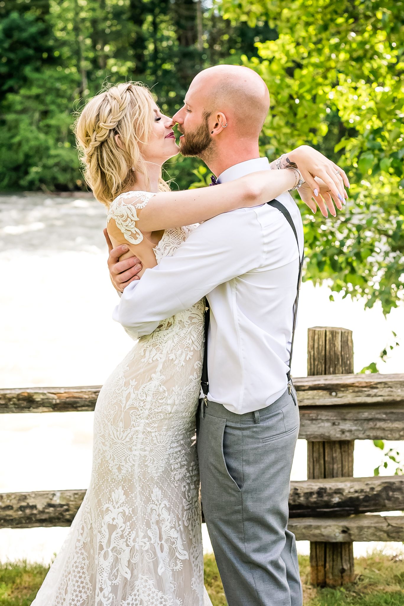A couple tenderly kisses on their wedding day. Photo in Hope, B.C. by Kari Mills Photography.