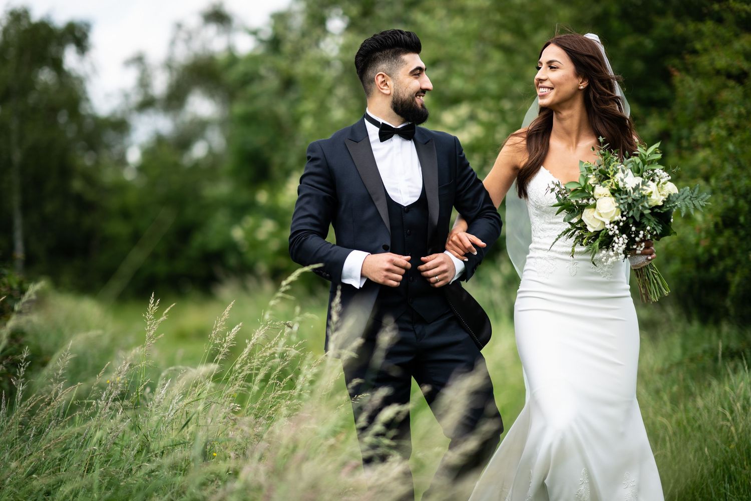newlyweds walk in fairlop waters near london, Wedding Photography Portraits image