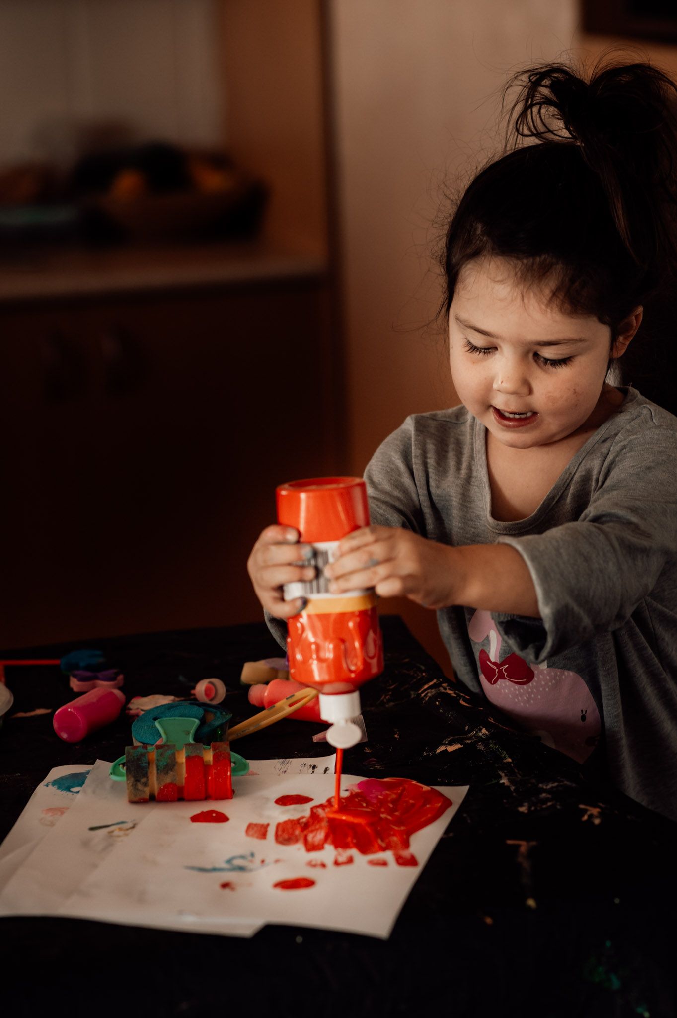 Young girl painting candid image