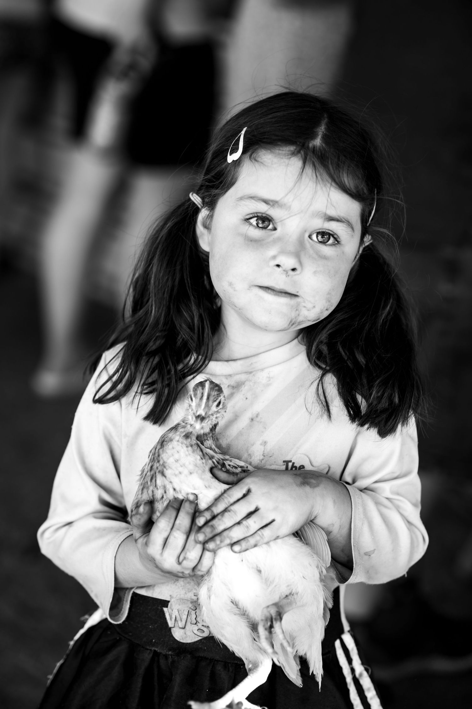 My daughter Isla holding a chicken