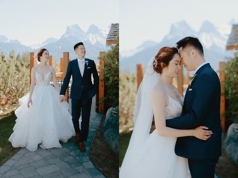 Wedding portraits with snow-capped mountain peaks and wooden beams framing the scene.