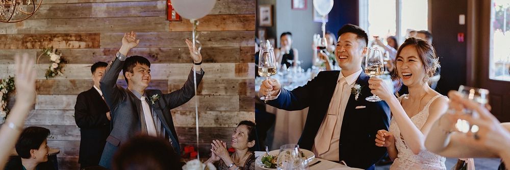 Elegant wedding celebration in progress with rustic wood paneled walls and romantic lighting.