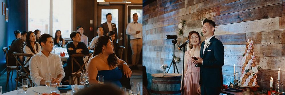 Wedding guests gathered in rustic venue with brick walls and elegant chandeliers overhead.