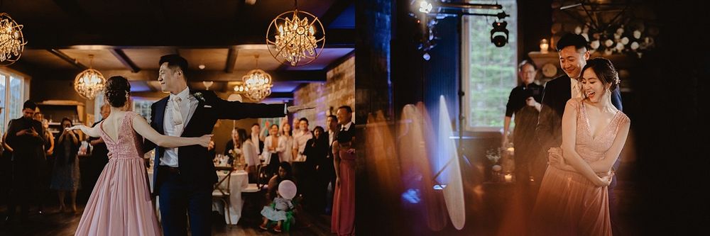 Romantic dance in a dimly lit venue decorated with hanging lights and chandeliers.