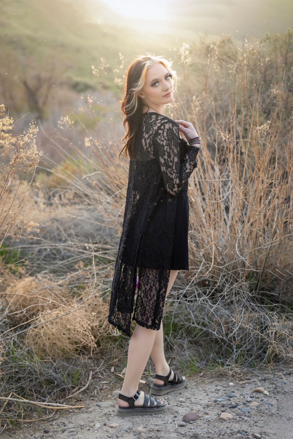 senior girl spring photos at swan falls near sunset