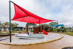 red playground sun shade Perth photography