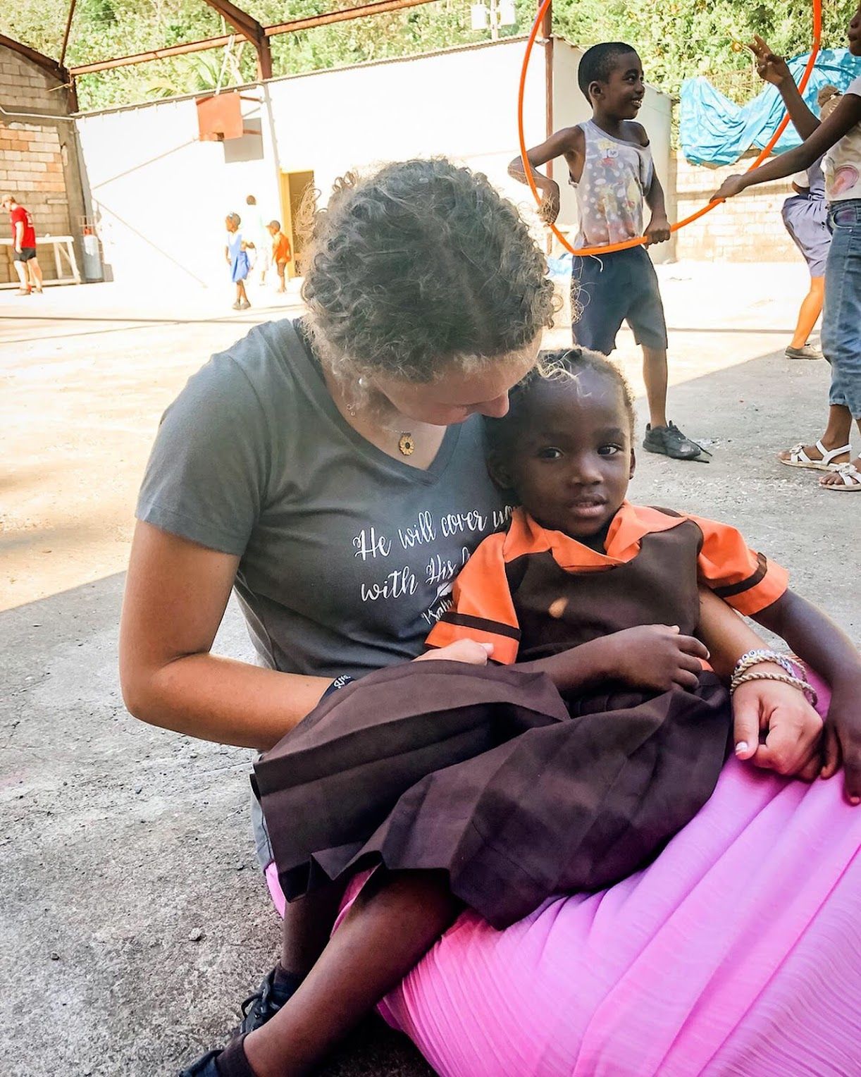 A caring moment shared during a community outreach event.