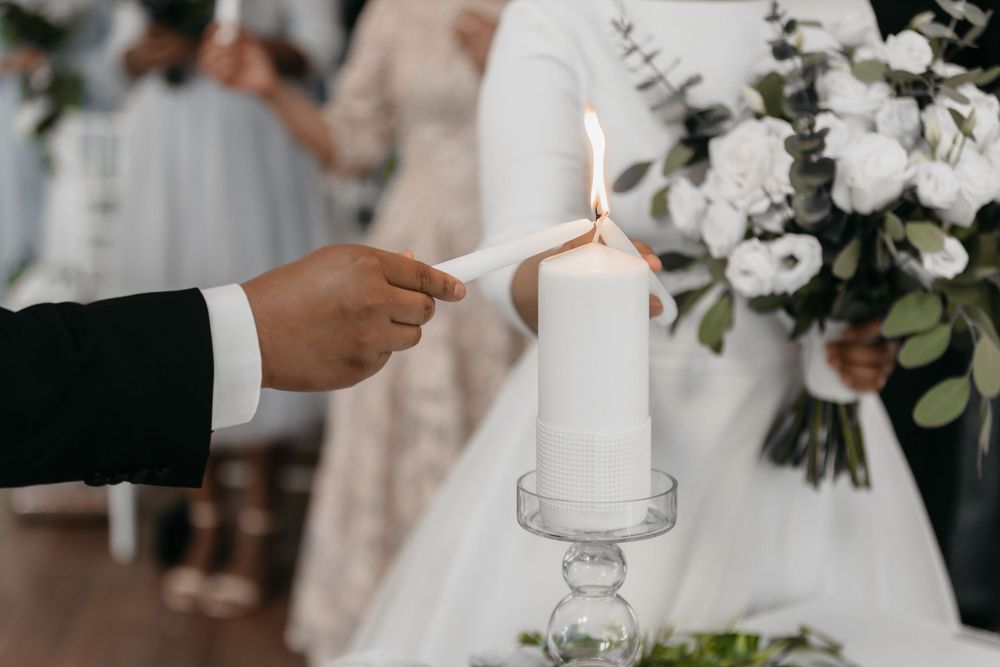 Natural light bright chapel wedding bride and groom exit natural green and white flowers