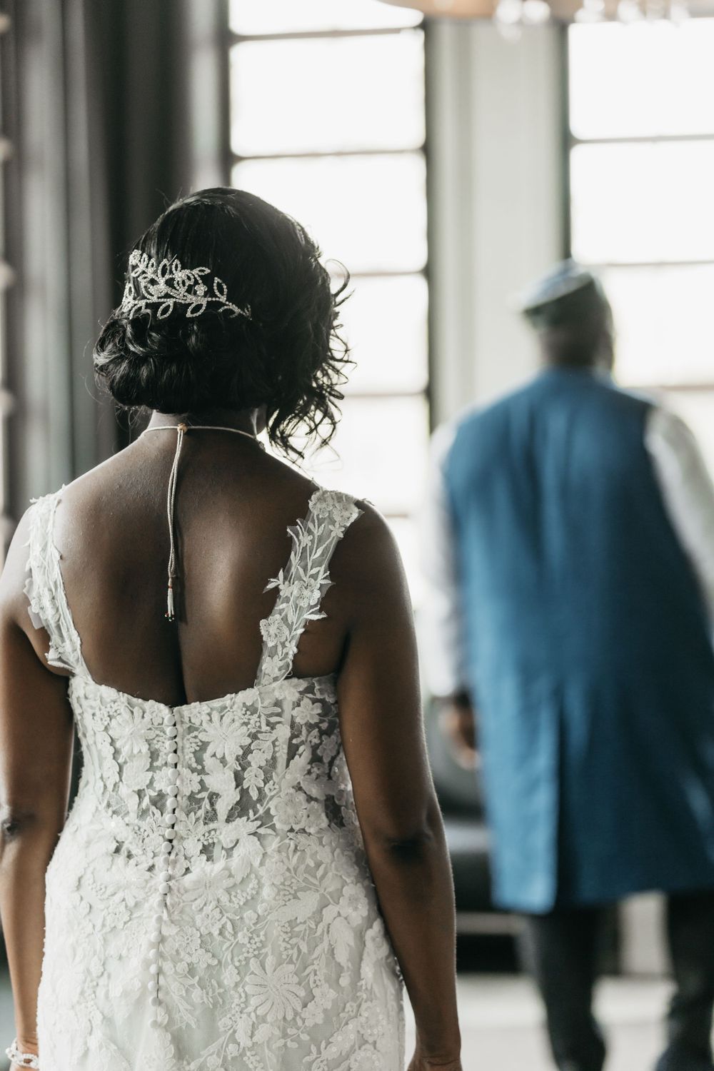 Fancy elegant hotel wedding first look bride and groom