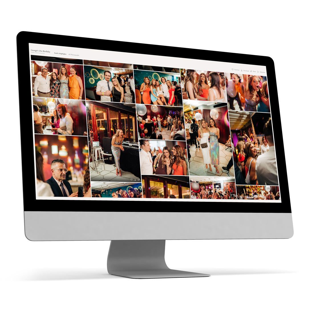 Computer monitor displaying a grid of event photography images.