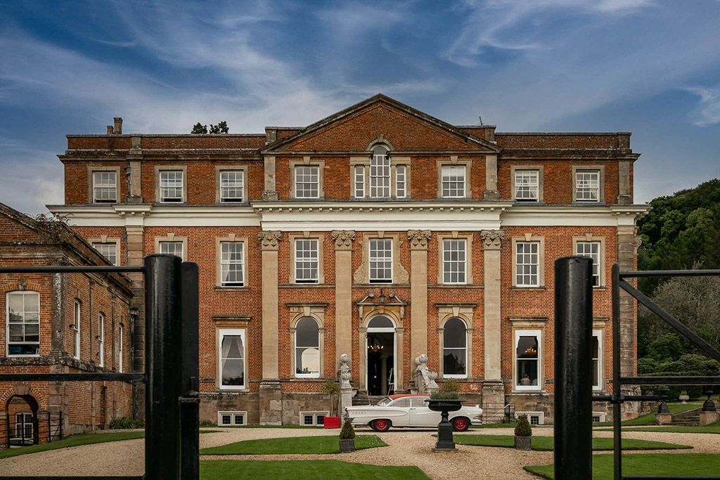 Large red brick Wedding venue in Somerset. Crowcombe Court Wedding photographer.