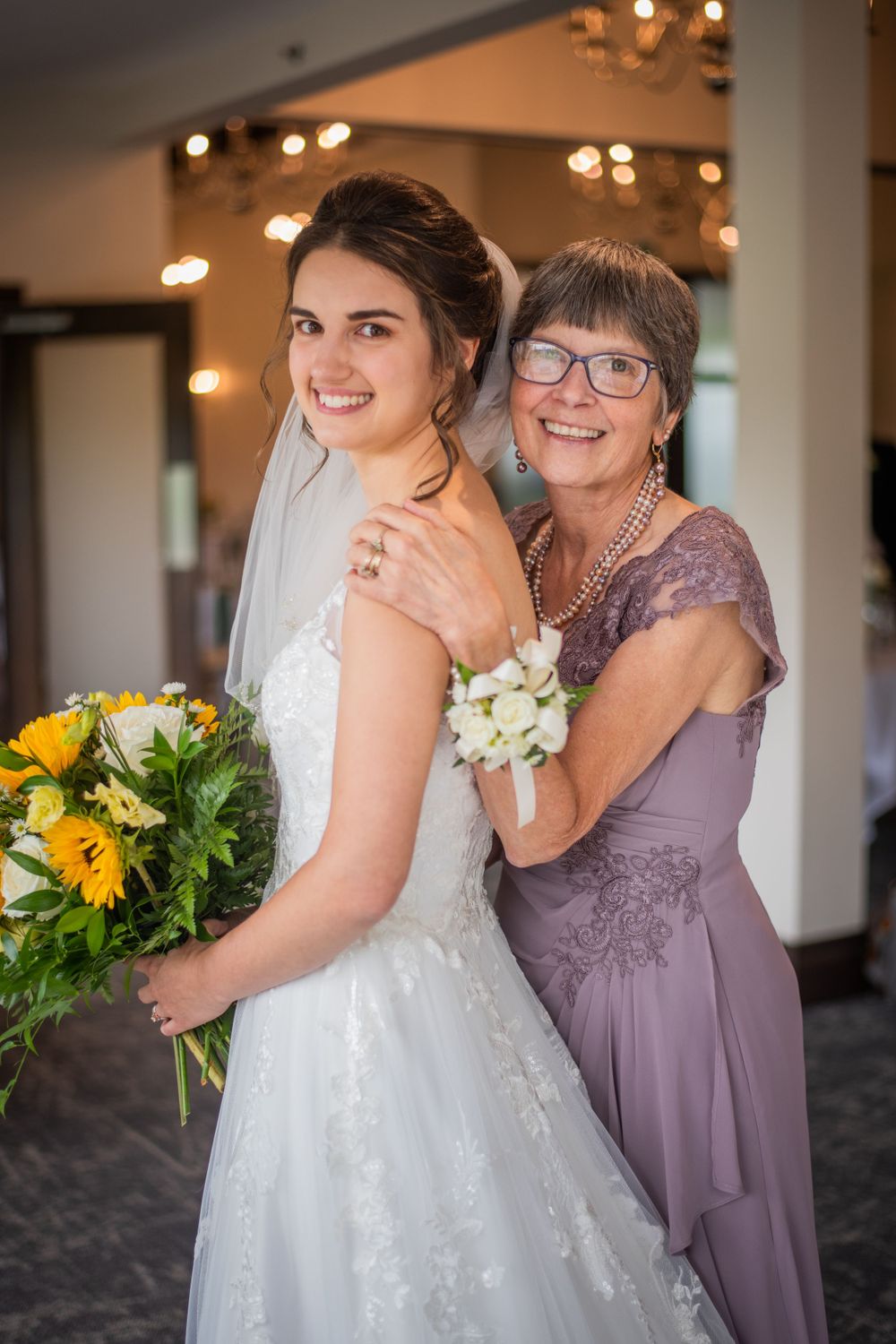 bride and mother of the bride before wedding ceremony