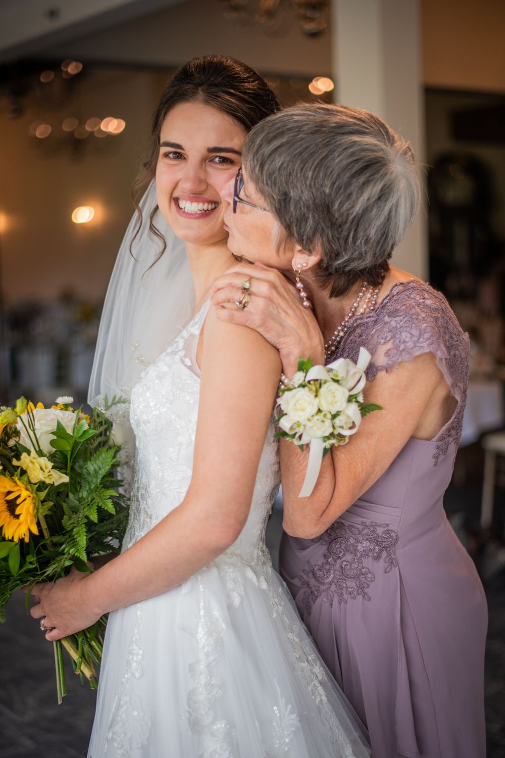 bride and mother of the bride before wedding ceremony at Stratford Country Club