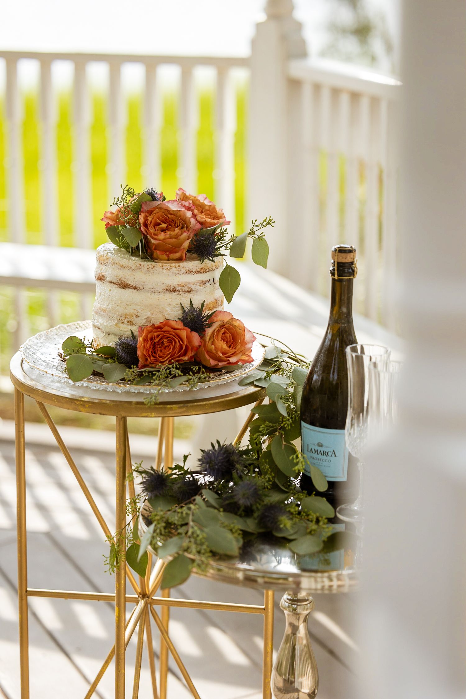 A shot of the wedding cake and champagne toast set up for an elopement wedding.