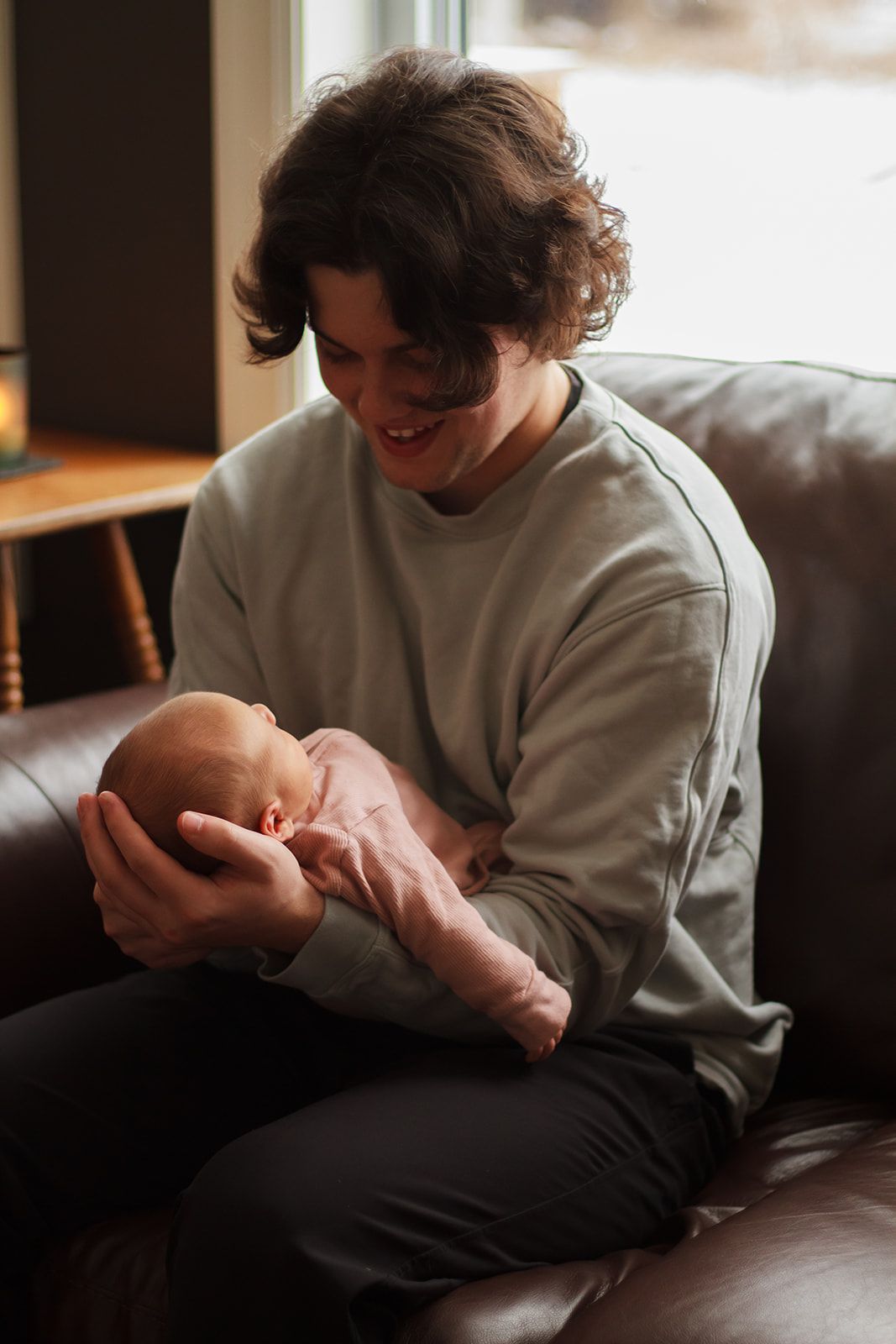 Dad and baby having moment during lifestyle newborn session.
