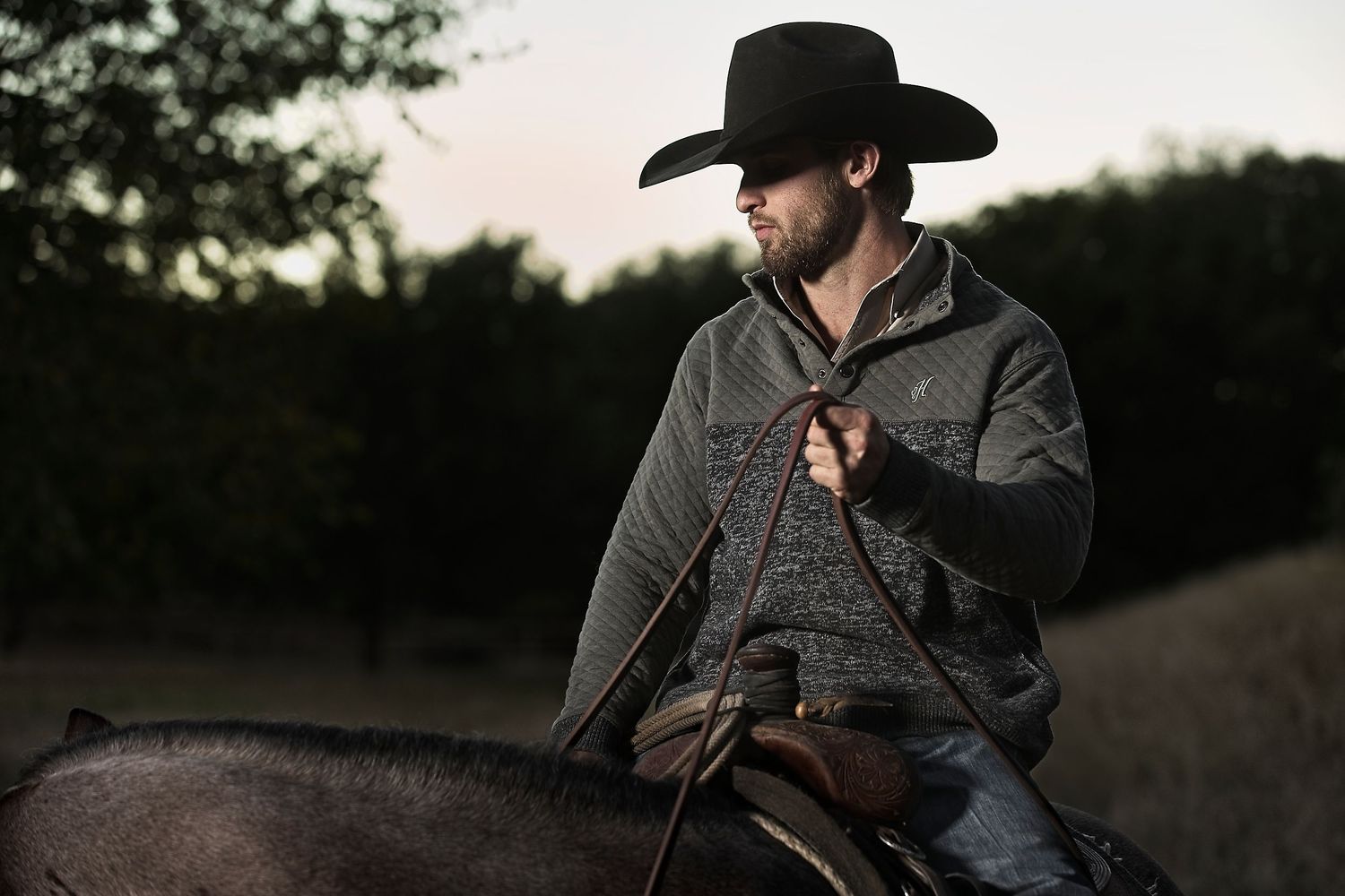 Leighton Berry wears a Hooey pullover while on an evening ride.