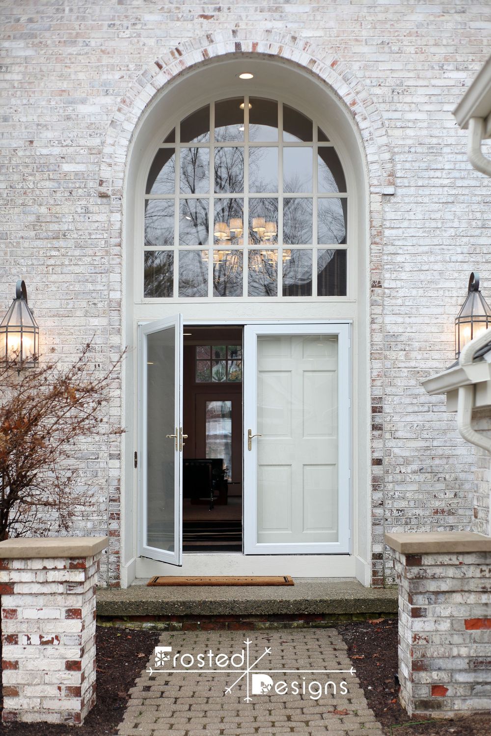 2 story front entrance of home as detail shot of exterior of real estate photography.