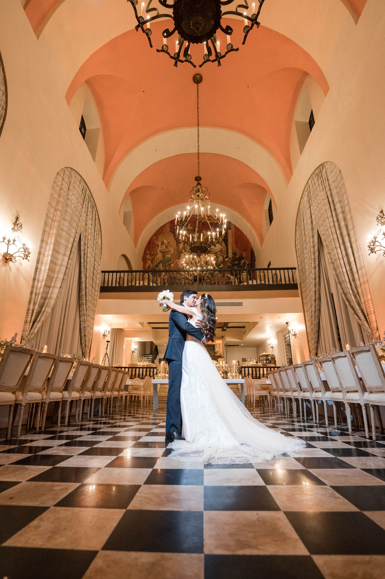 Newlyweds dancing at their ceremony in Hotel El Convento in Old San Juan Puerto Rico. Photo by Gary Rosado Photography