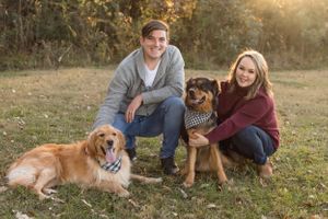 Portrait with husband, wife, and two dogs