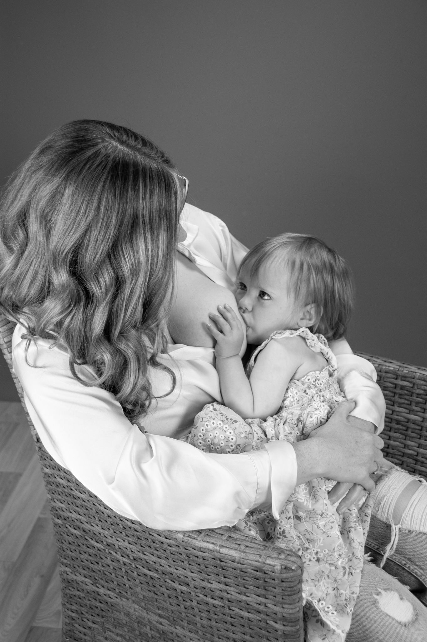 Professional Breastfeeding Photoshoot in chair